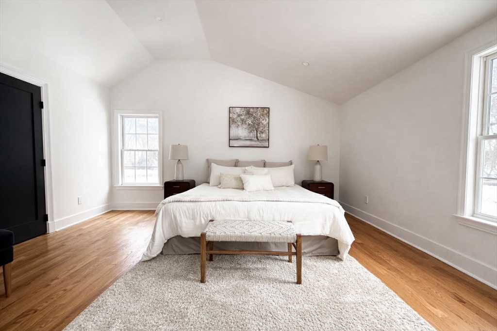 576 Grove Street Framingham, MA 01701 - Photo 15 of 38 a bedroom with a bed and a window