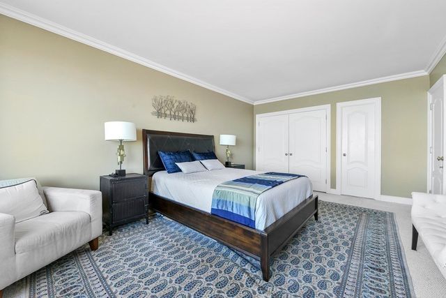 a bathroom with a sink a vanity and a shower