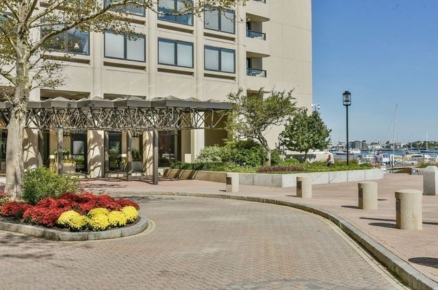 a view of a lobby with a patio and a yard