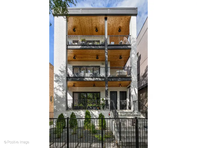 a view of a living room with a large window