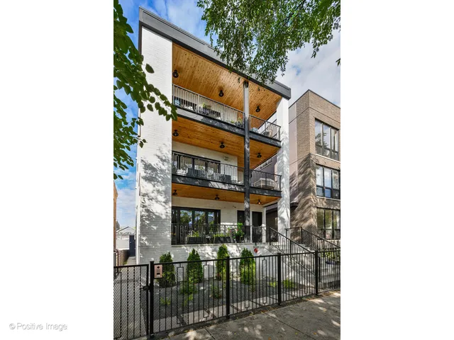 a street sign on a pole on a street