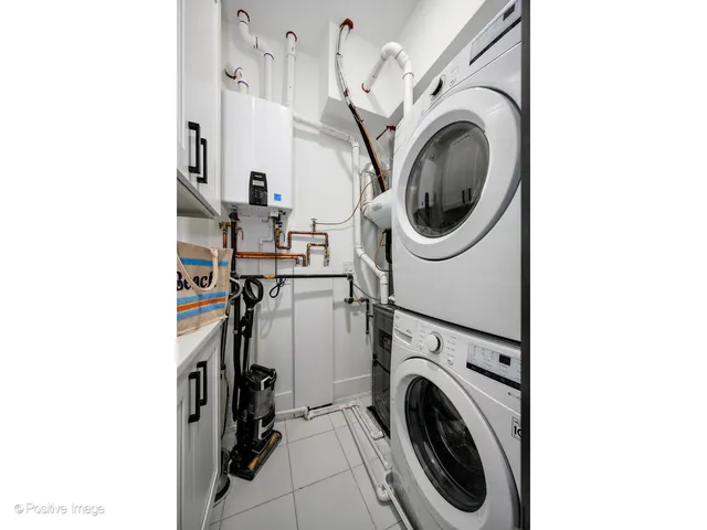 a view of a room with washer and dryer