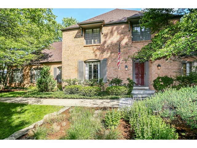 a view of a house with a garden