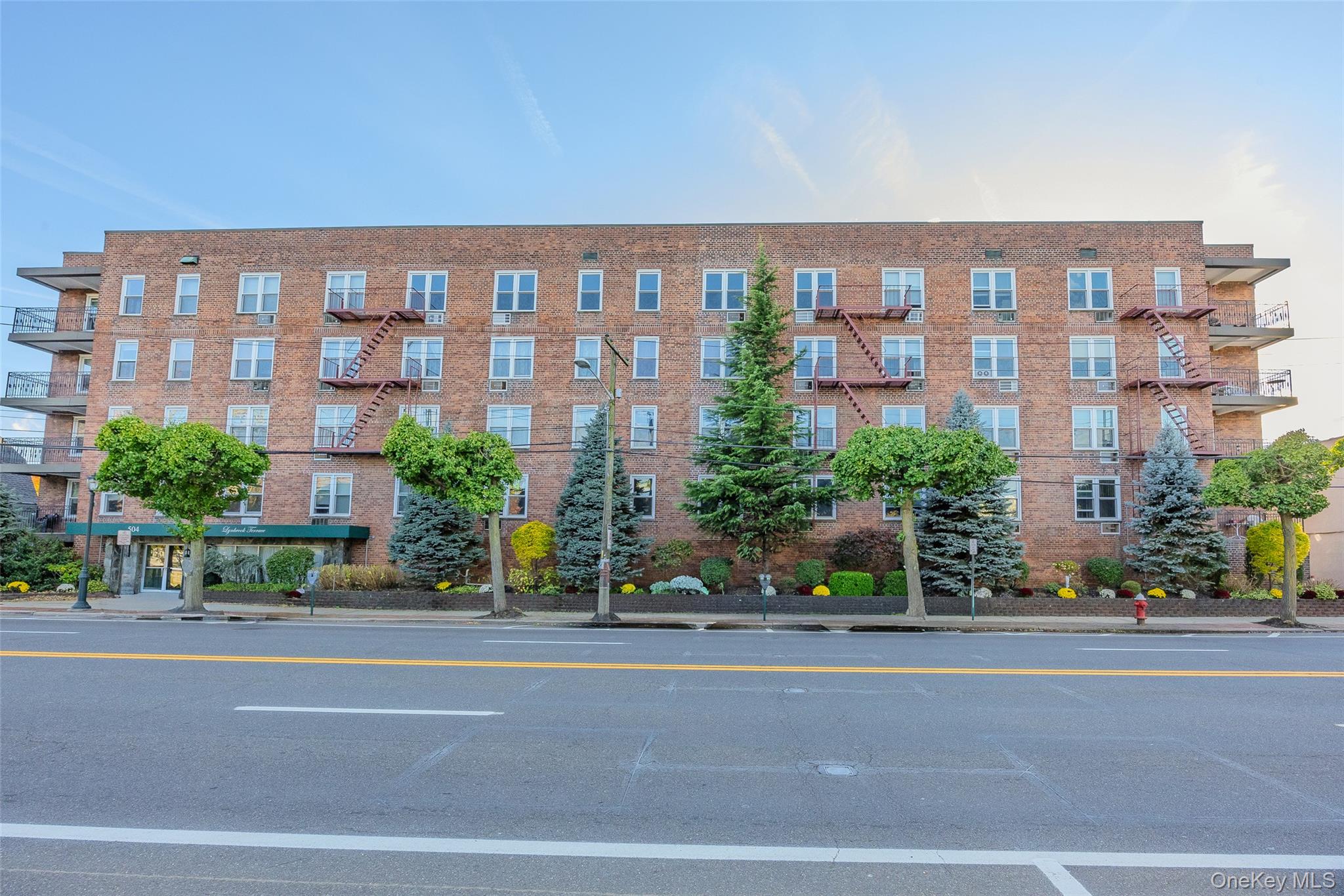 a view of a building with a street