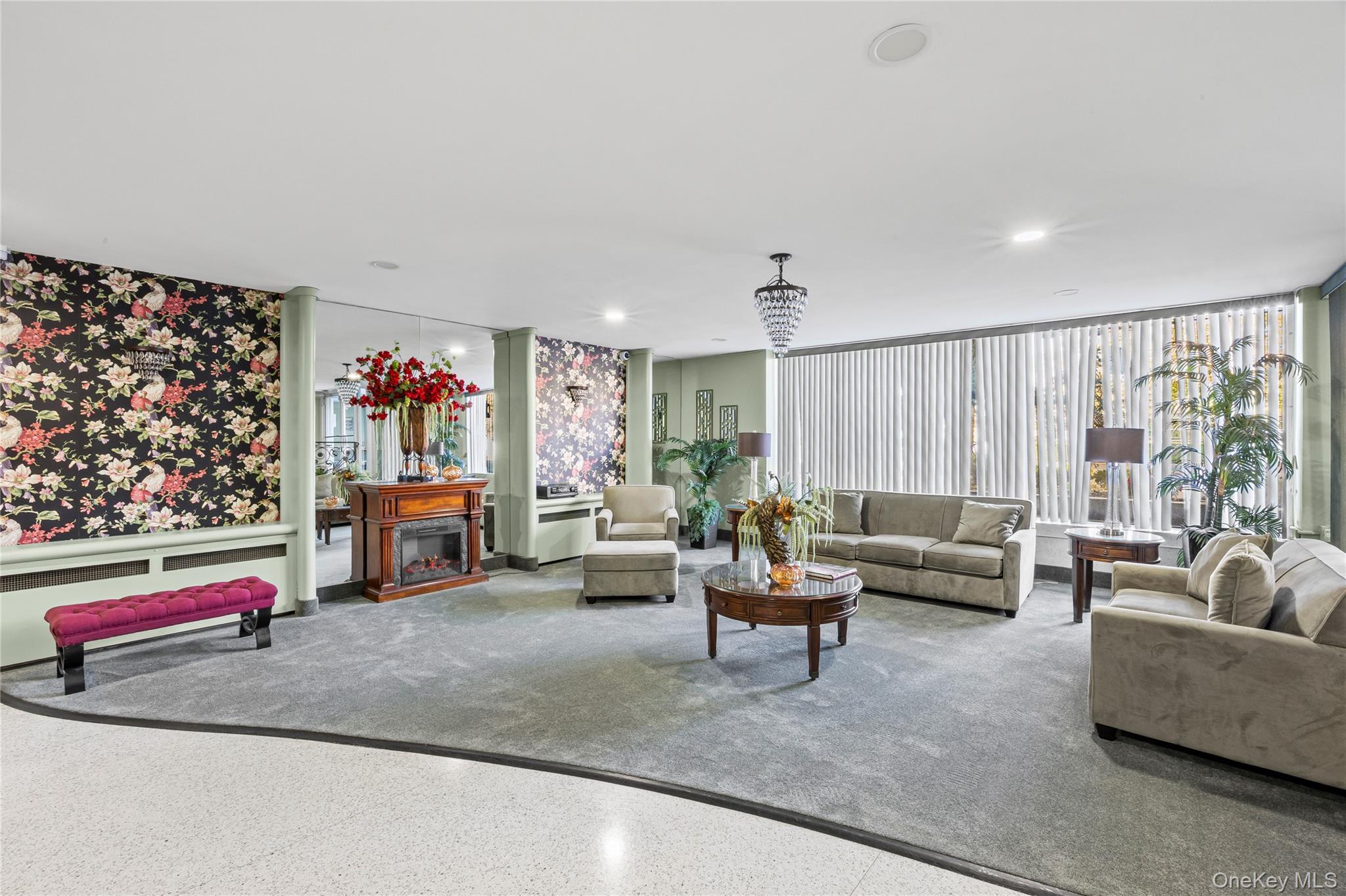 504 Merrick Road, Unit 4E Lynbrook, NY 11563 - Photo 17 of 19 a living room with furniture and a couch