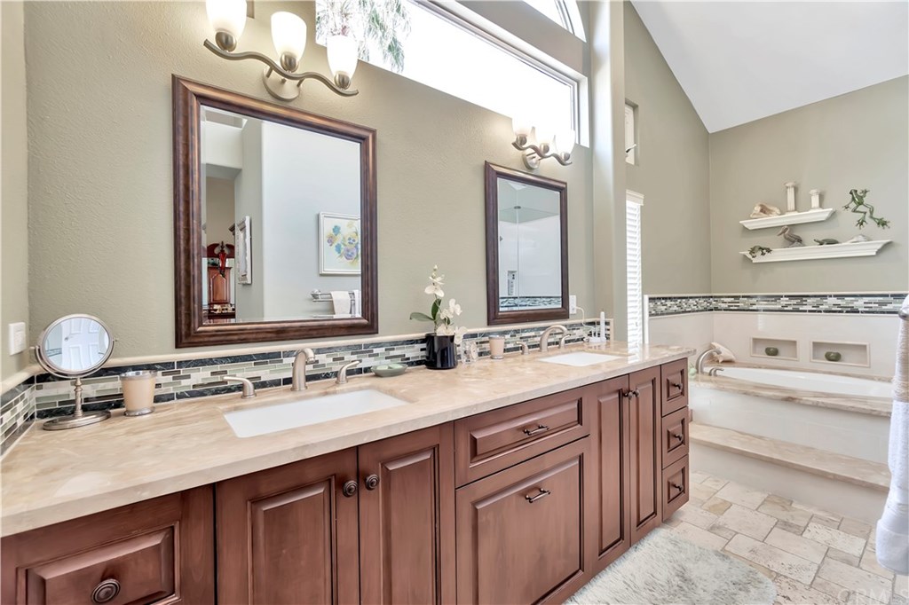 346 Long Long Beach, CA 90803 - Photo 13 of 24 Remodeled master bathroom with ample cabinet and storage space.