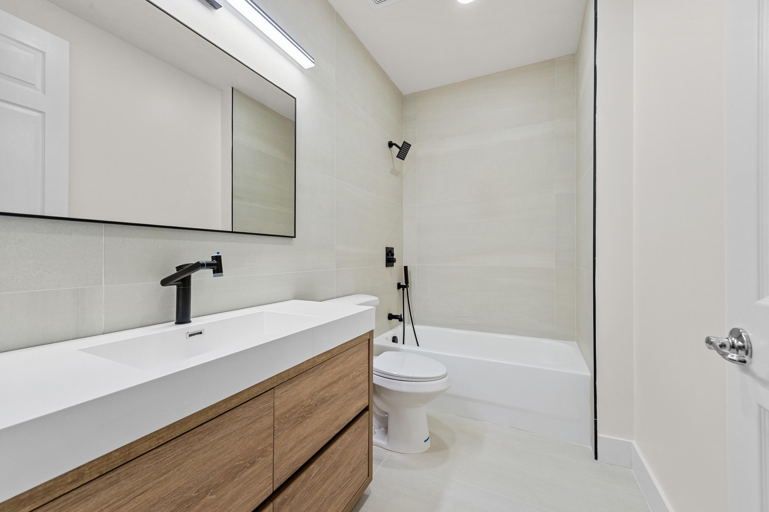 8680 Daystar Ridge Point Boynton Beach, FL 33473 - Photo 14 of 25 a bathroom with a sink a toilet and shower