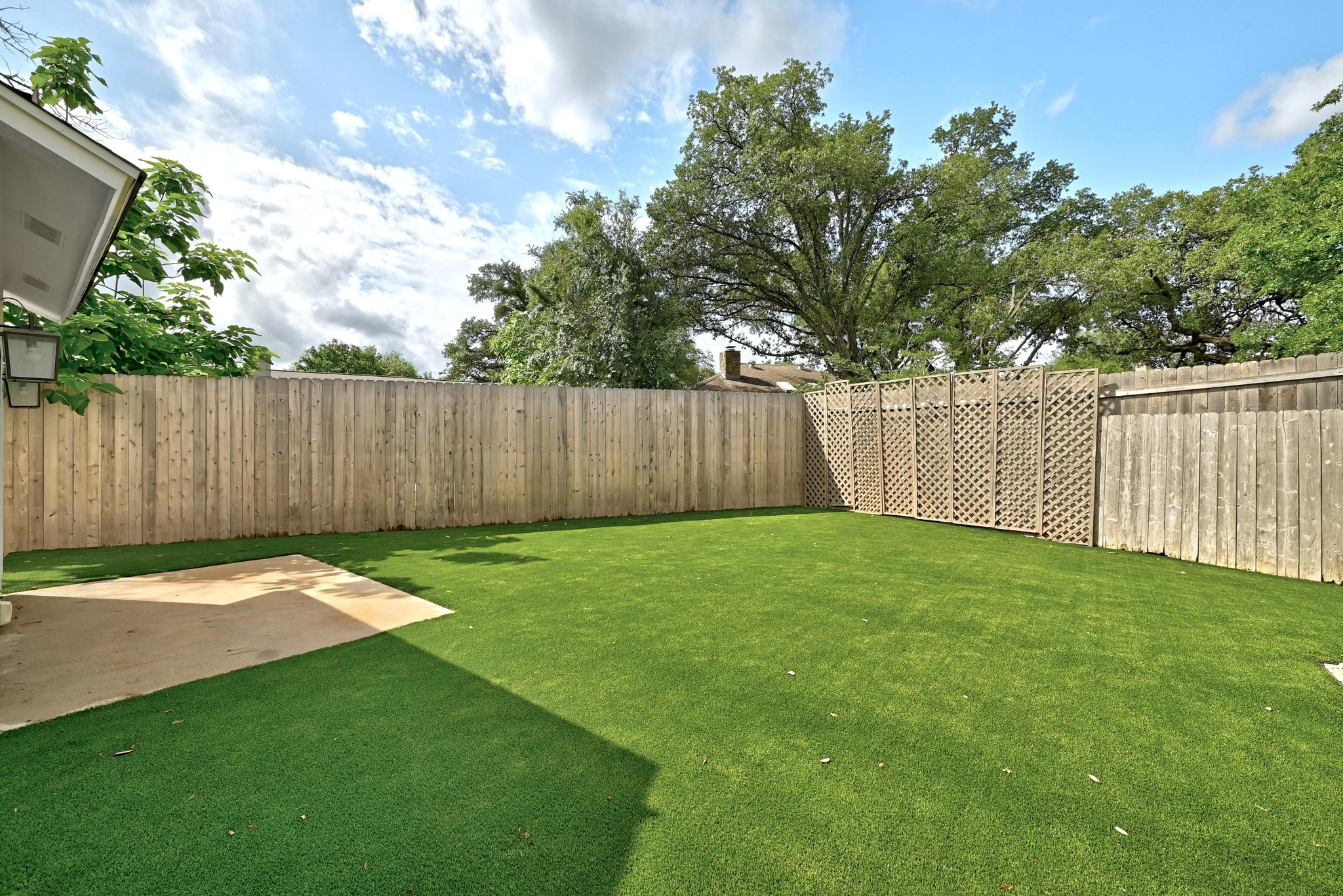 5807 Convict Hill Road Austin, TX 78749 - Photo 25 of 27 The recently turfed back yard is a perfect canvas for outdoor activities.