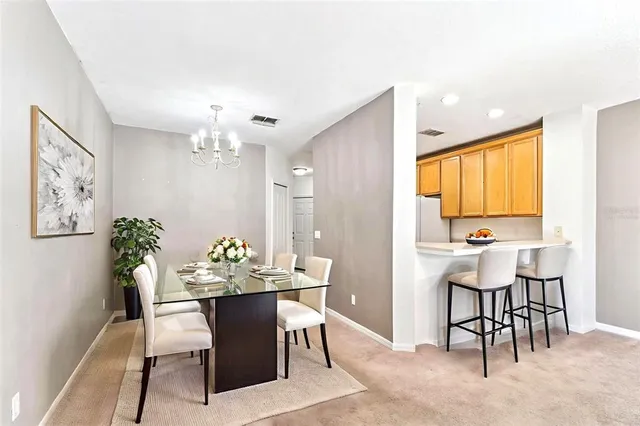 a view of a dining room with furniture
