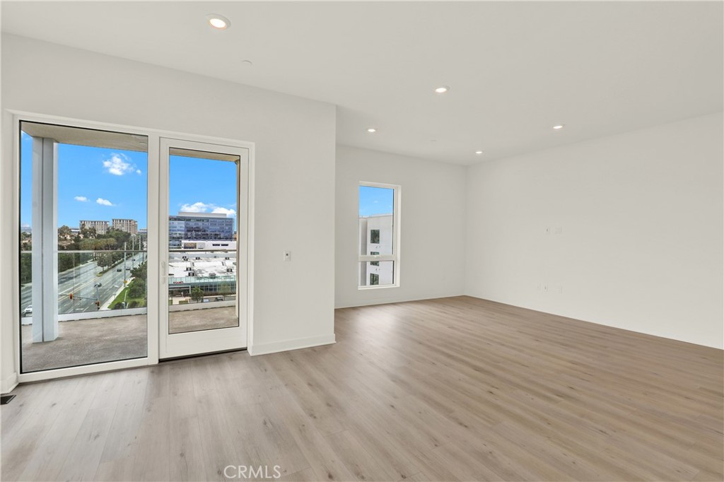 3715 Rivington Irvine, CA 92612 - Photo 11 of 65 wooden floor in an empty room with a window