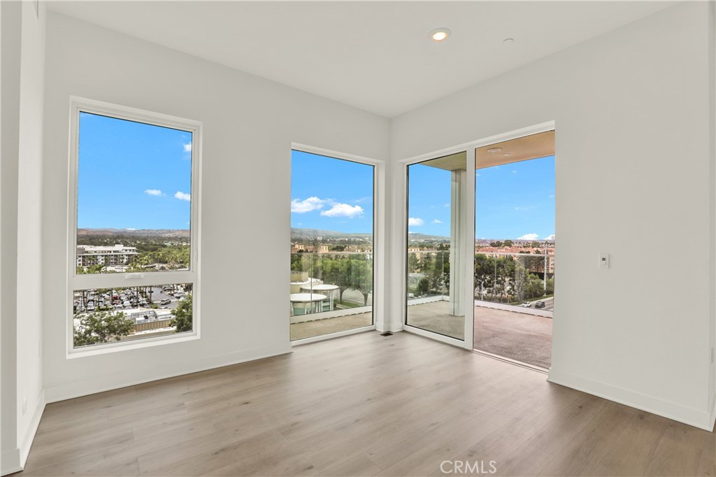 3715 Rivington Irvine, CA 92612 - Photo 13 of 65 wooden floor in an empty room with a window