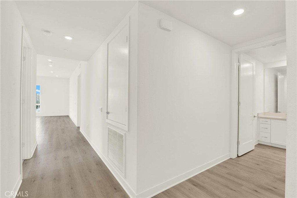 3715 Rivington Irvine, CA 92612 - Photo 2 of 65 a view of a hallway with wooden floor