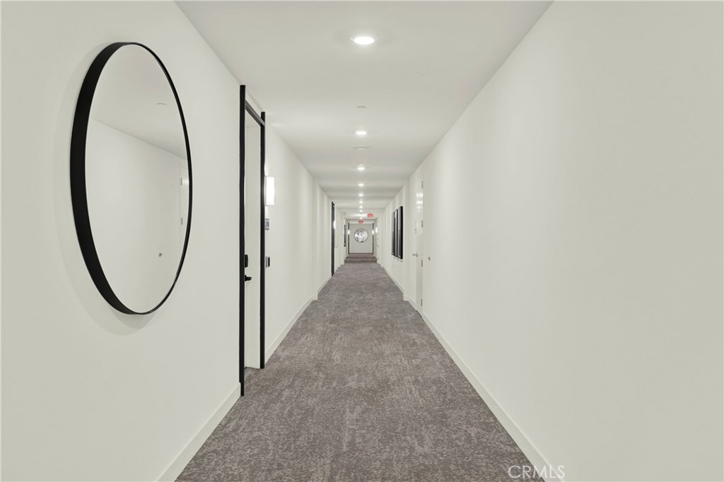 3715 Rivington Irvine, CA 92612 - Photo 32 of 65 an entryway in a hall with a mirror