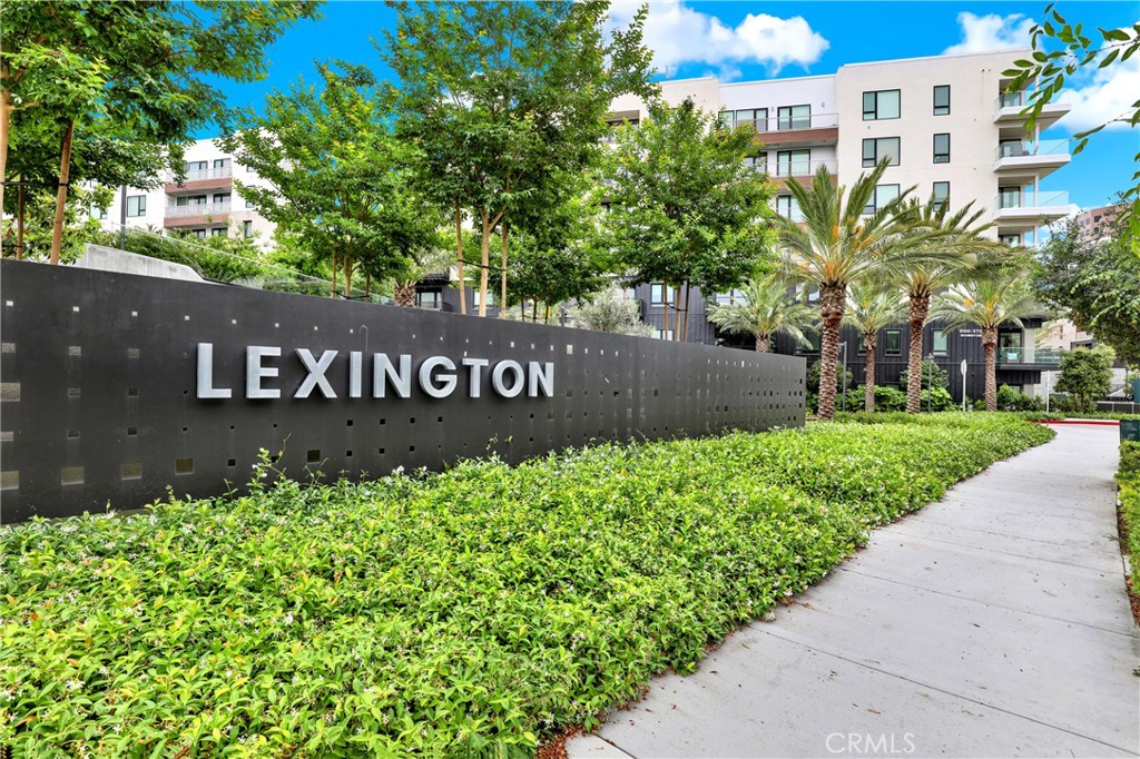 3715 Rivington Irvine, CA 92612 - Photo 34 of 65 a view of outdoor space with signage and flags