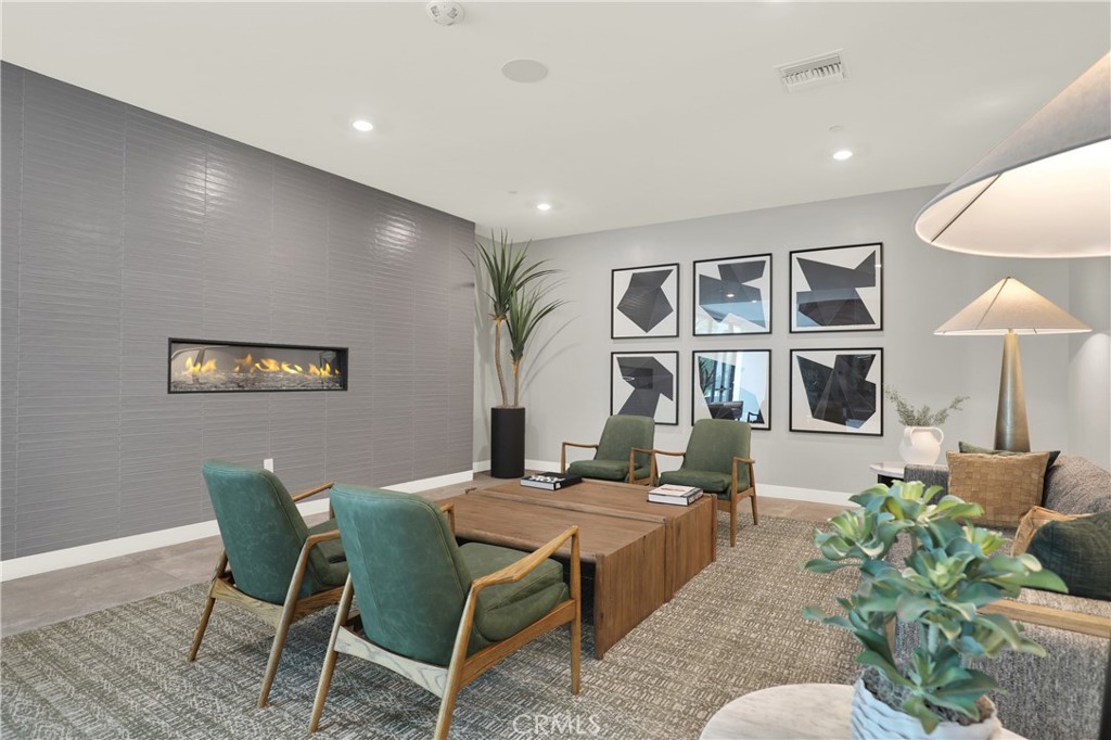 3715 Rivington Irvine, CA 92612 - Photo 49 of 65 a living room with furniture and a wooden floor