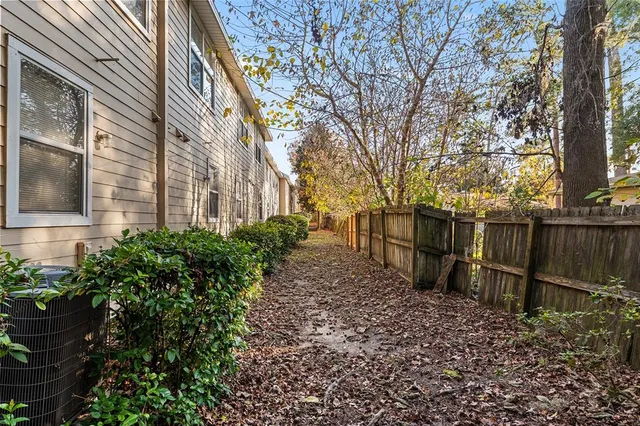 a backyard of a house with lots of green space
