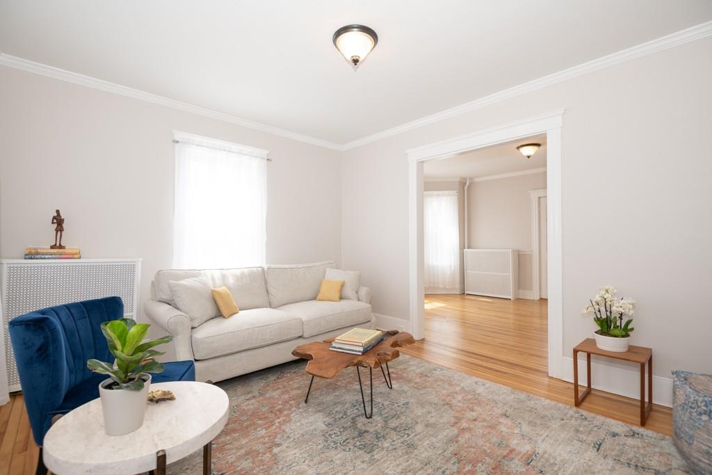 11 Wrentham Road Worcester, MA 01602 - Photo 11 of 28 a living room with furniture and a potted plant