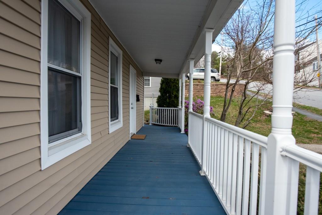 11 Wrentham Road Worcester, MA 01602 - Photo 3 of 28 a view of a porch with wooden floor and stairs