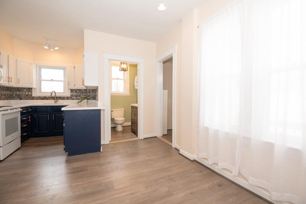 11 Wrentham Road Worcester, MA 01602 - Photo 8 of 28 a view of a kitchen with a sink and a window