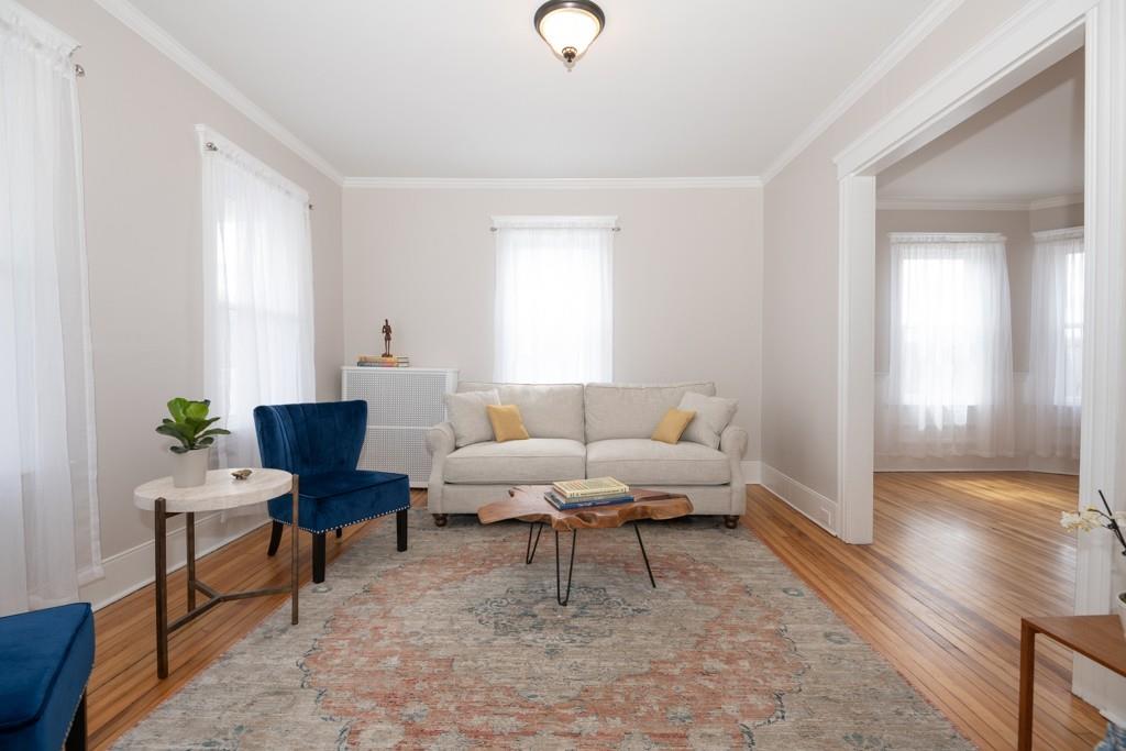 11 Wrentham Road Worcester, MA 01602 - Photo 9 of 28 a living room with furniture and wooden floor