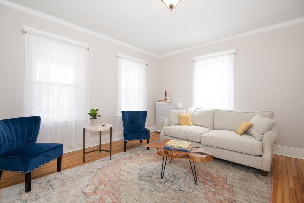 11 Wrentham Road Worcester, MA 01602 - Photo 10 of 28 a living room with furniture and a rug