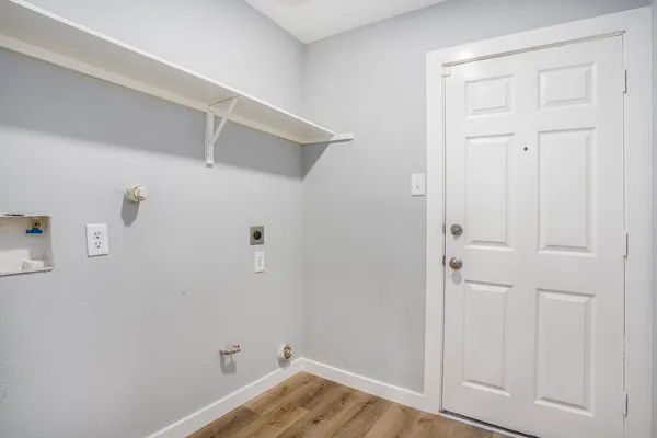 a view of small space with racks on the wall