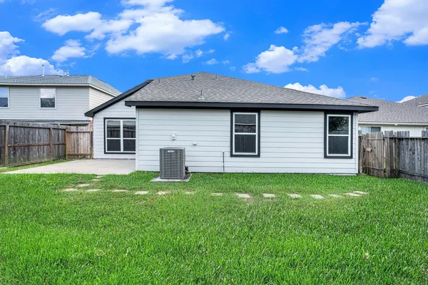 a house view with a garden space