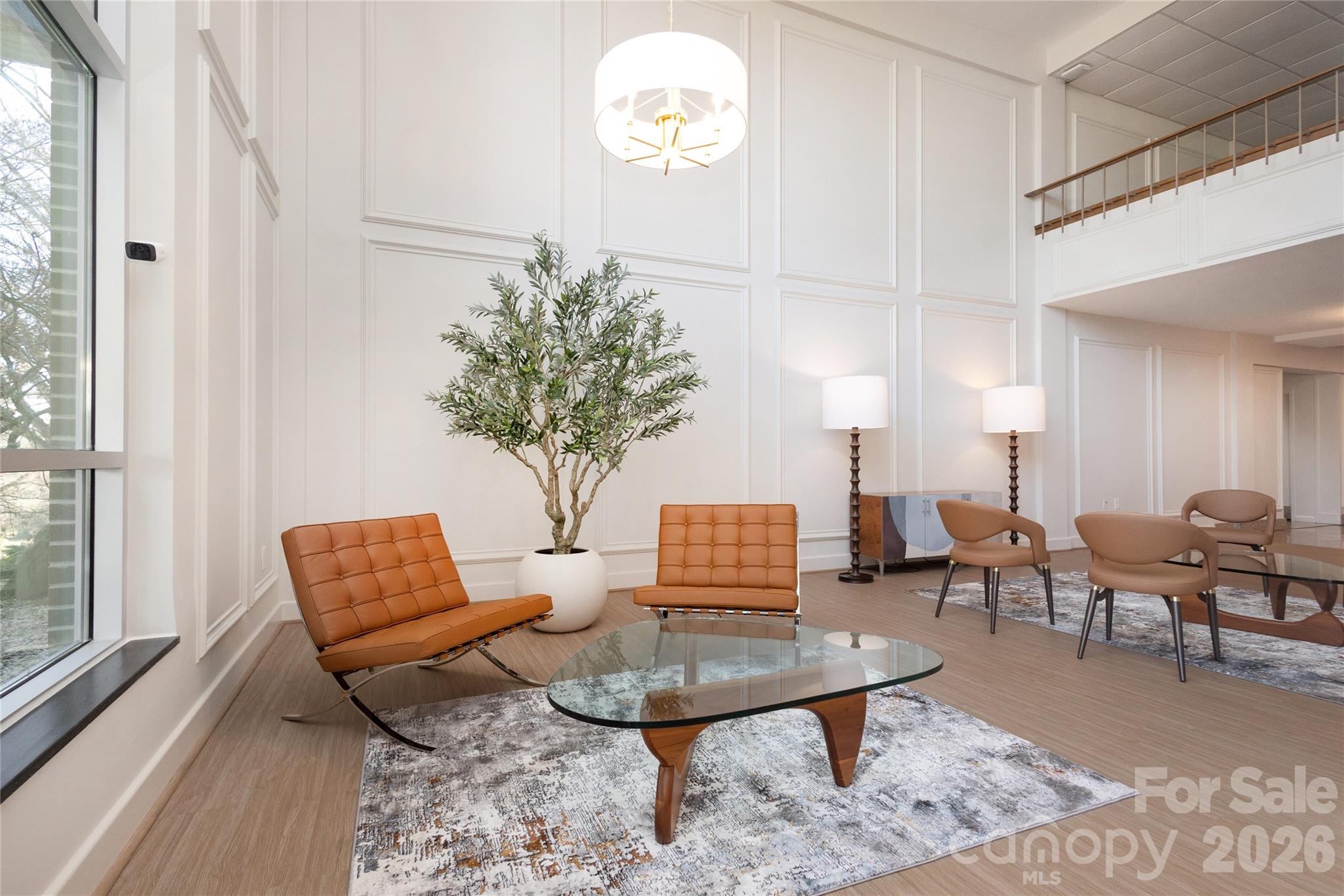 1300 Reece Road, Unit 300 Charlotte, NC 28209 - Photo 15 of 23 a living room with furniture a rug and a window