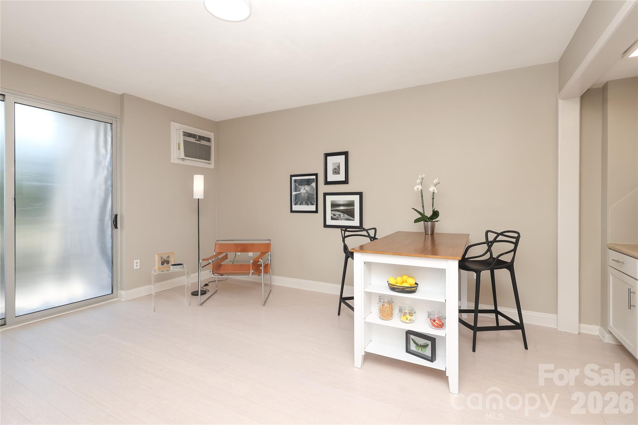 1300 Reece Road, Unit 300 Charlotte, NC 28209 - Photo 8 of 23 a living room with furniture and a table