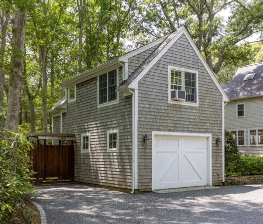 a front view of a house with a garage