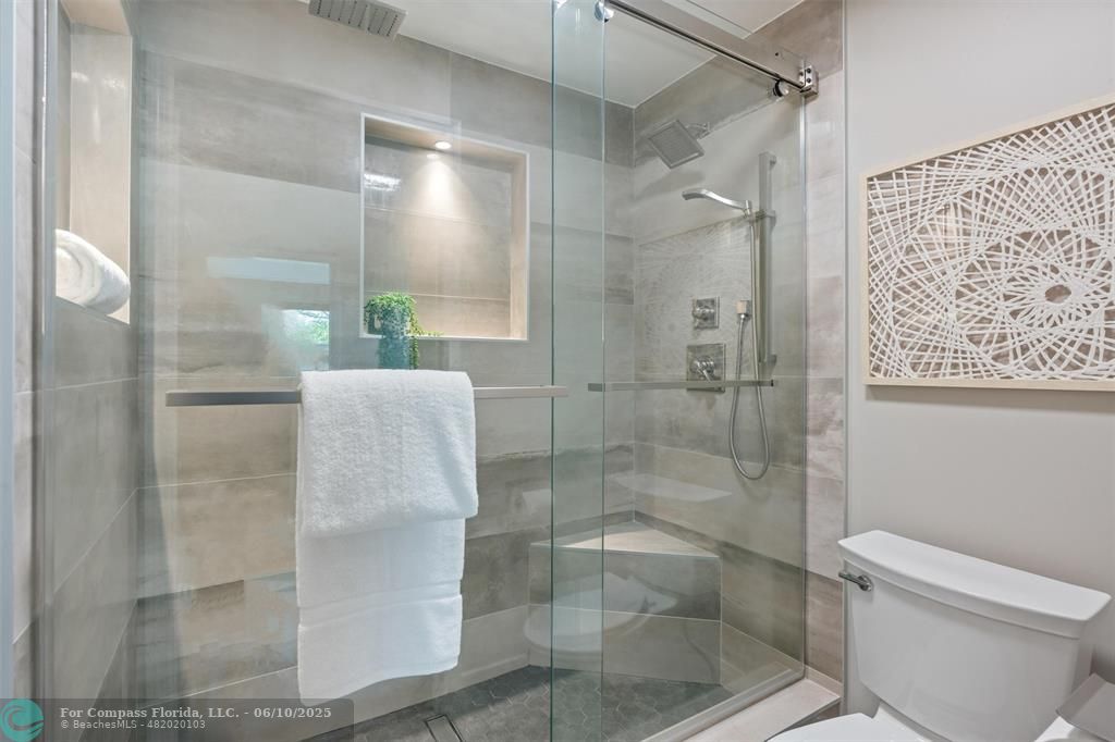 9804 Northwest 1st Court, Unit 9804 Plantation, FL 33324 - Photo 13 of 25 a bathroom with a shower