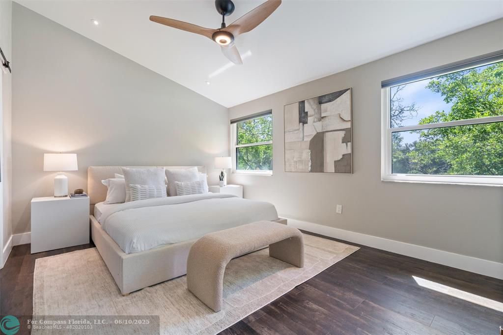 9804 Northwest 1st Court, Unit 9804 Plantation, FL 33324 - Photo 10 of 25 a bedroom with a bed and window