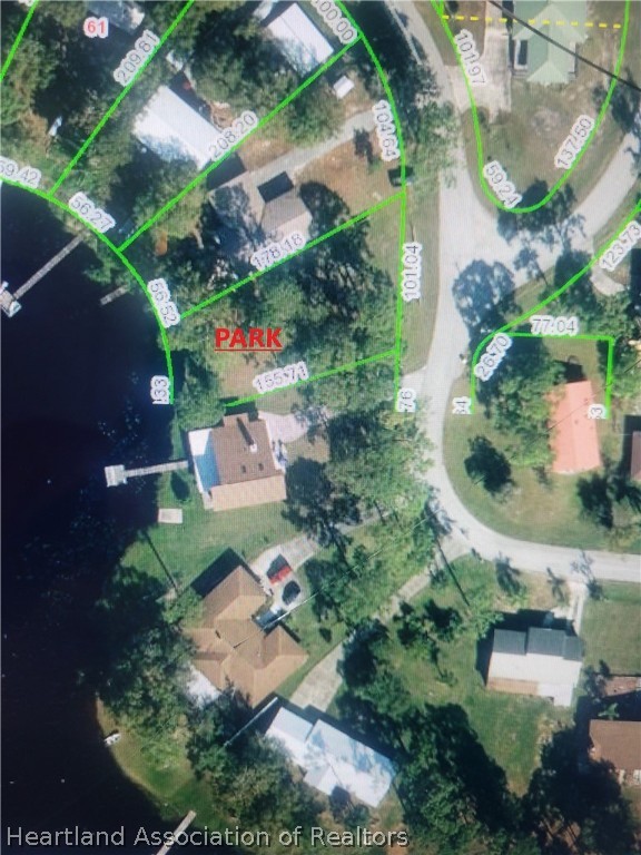1625 Bassage Road Sebring, FL 33875 - Photo 3 of 3 an aerial view of a house with a yard