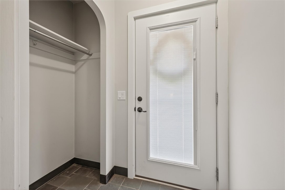 45 Longcroft Road Irondequoit, NY 14609 - Photo 9 of 39 New front door with enclosed blinds and storm door