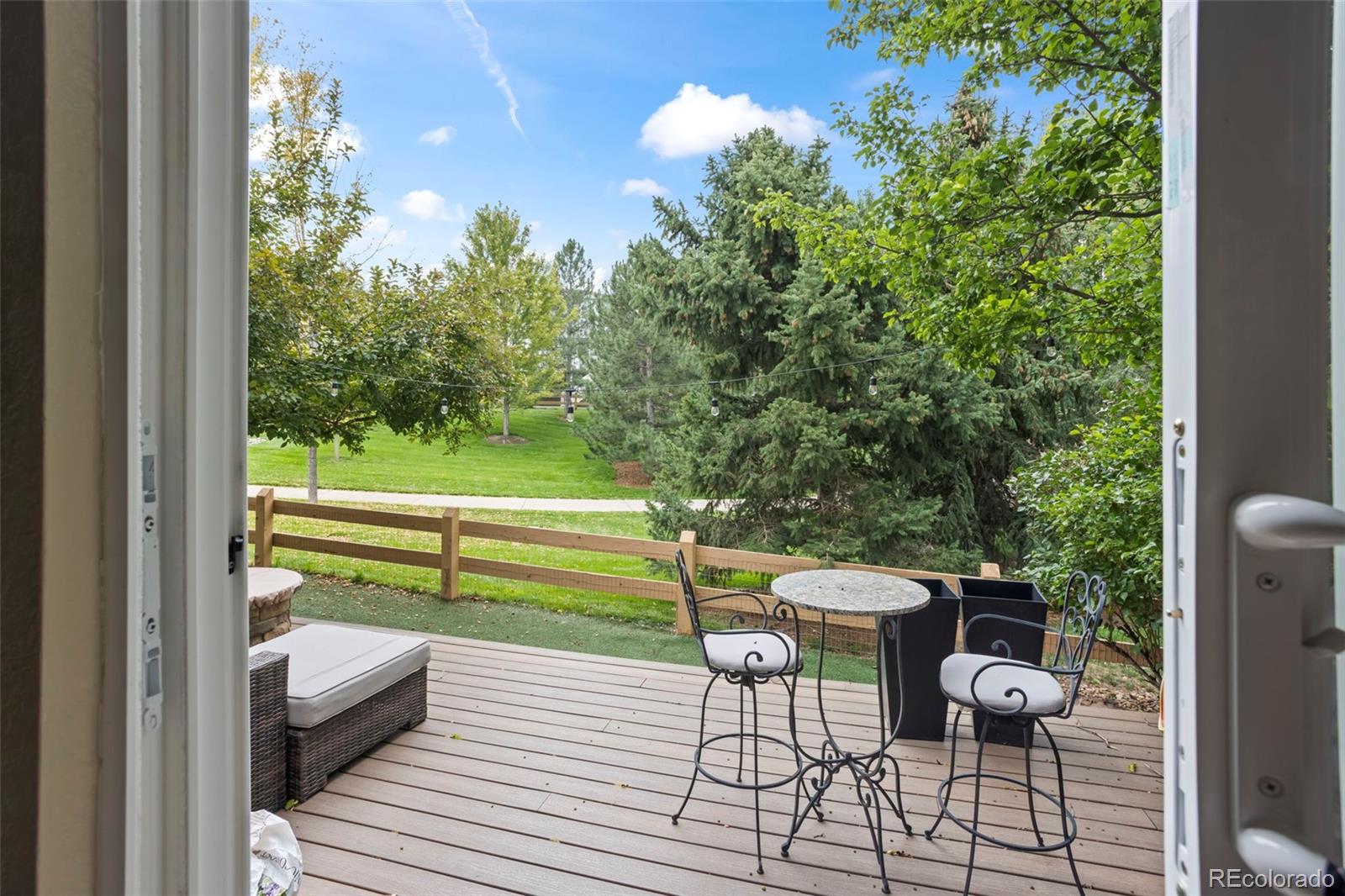 10704 Riverbrook Circle Highlands Ranch, CO 80126 - Photo 39 of 40 a view of a chairs and table in the balcony