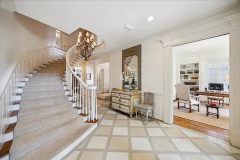 a view of entryway livingroom and hall