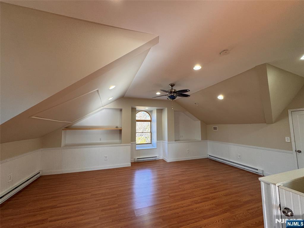232 Franklin Turnpike Allendale, NJ 07401 - Photo 24 of 30 a view of empty room with wooden floor and fan