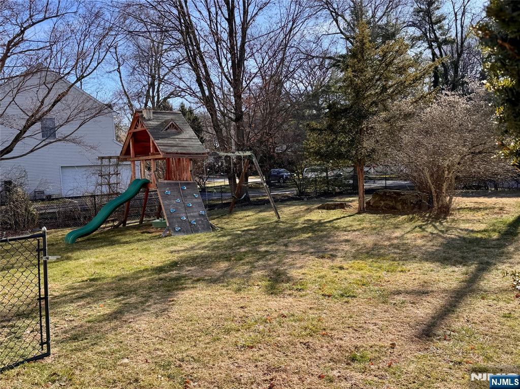 232 Franklin Turnpike Allendale, NJ 07401 - Photo 30 of 30 a view of a playground with a tree