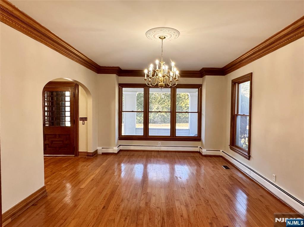232 Franklin Turnpike Allendale, NJ 07401 - Photo 5 of 30 wooden floor in an empty room with a window