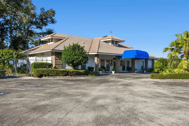 a view of a porch with a bench in patio