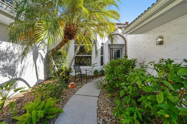 a house with a tree in front of it