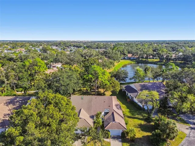 an aerial view of residential house with outdoor space