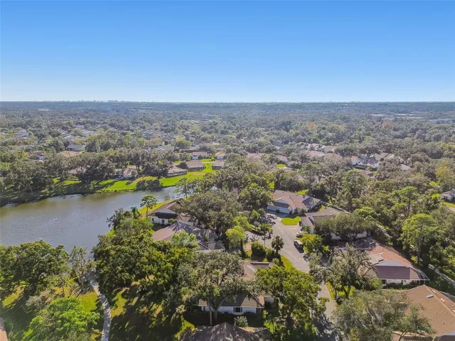 a view of a swimming pool with an outdoor space and seating area