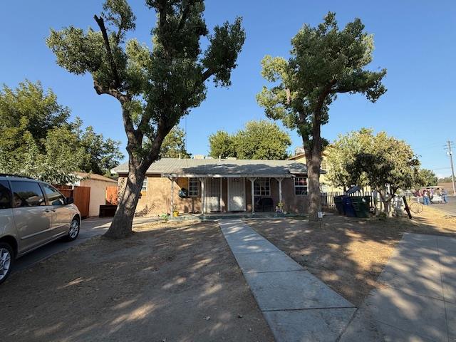 137 Sycamore Street Madera, CA 93638 - Photo 8 of 10 a view of a house with a patio