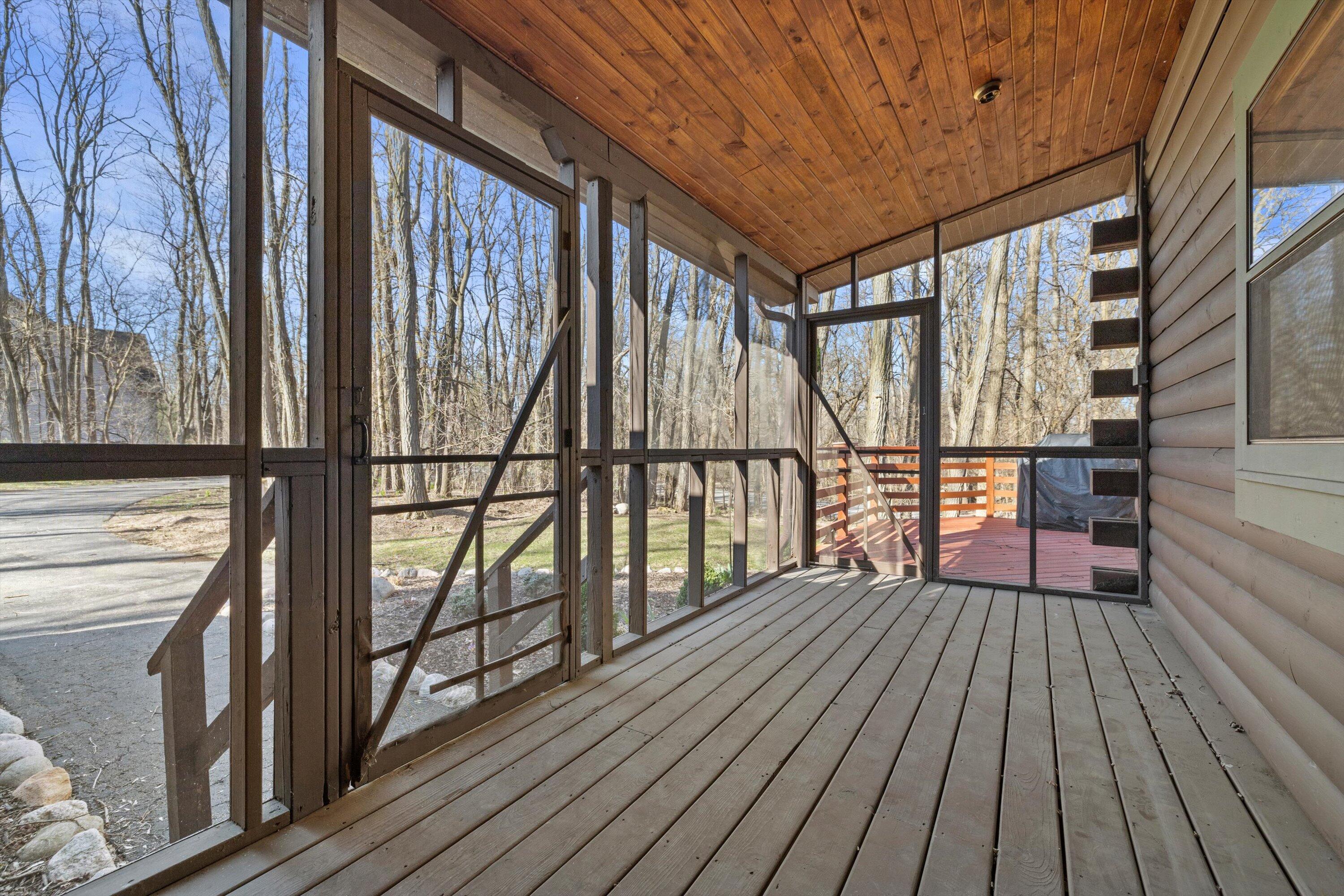 9225 400th Avenue Randall, WI 53128 - Photo 46 of 59 Screened Front Porch