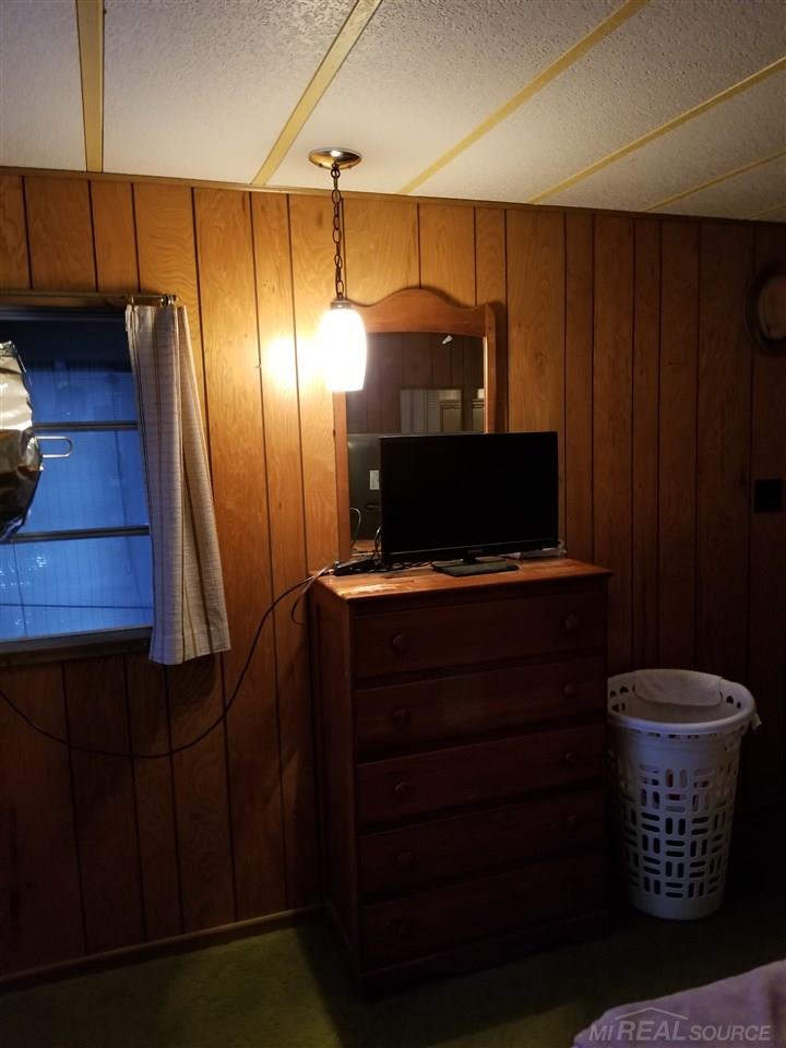 6340 Downington Road Deckerville, MI 48427 - Photo 34 of 56 Master bedroom comes complete with television which was purchased in 2017