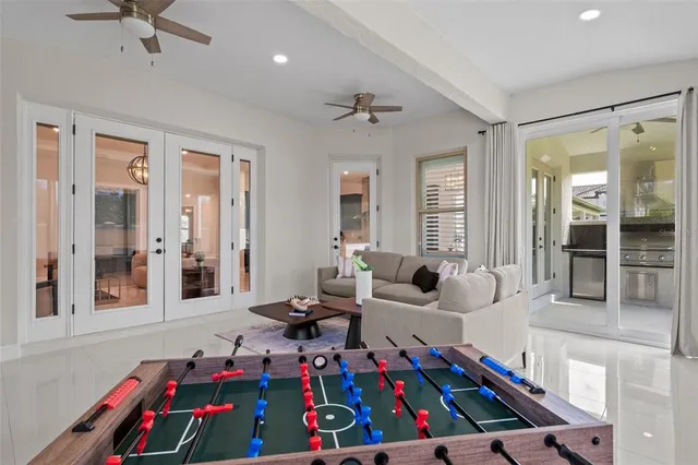 a bedroom with furniture and windows