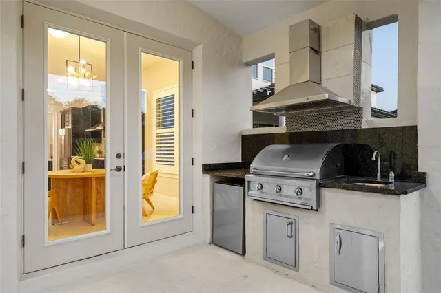 a kitchen with a stove and a cabinet