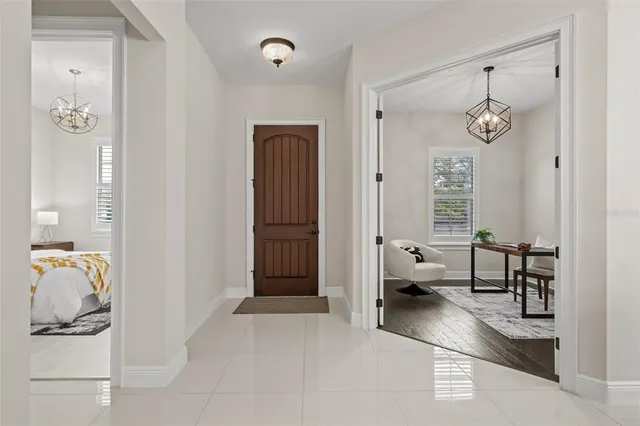 a bedroom with furniture and window