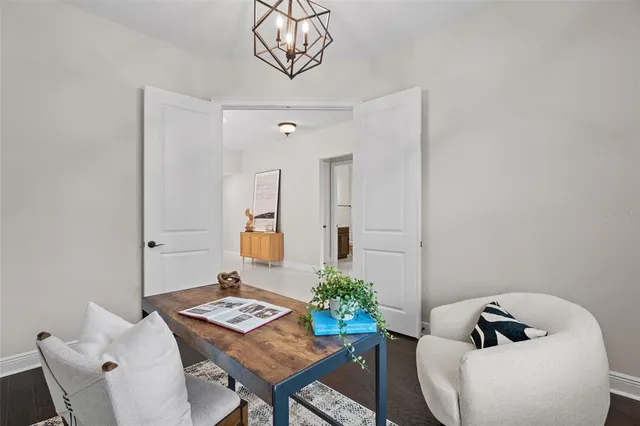 a view of a workspace with furniture